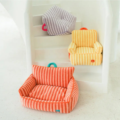 Three colorful striped pet beds on a white floor.
JoyPup Universal Sofa-Style Pet Bed – Soft Velvet, Cozy & Detachable,