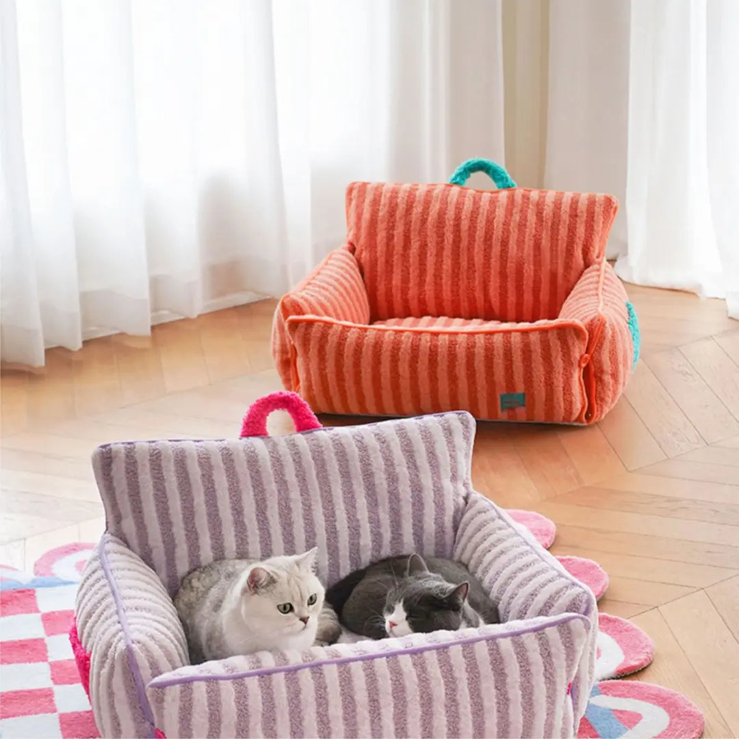 Two cats in striped pet beds on a wooden floor with curtains in the background
JoyPup Universal Sofa-Style Pet Bed – Soft Velvet, Cozy & Detachable,