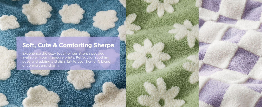 Textured fabric with snowflake patterns in blue, green, and purple, featuring a soft, cute, and comforting sherpa label of donut dog bed