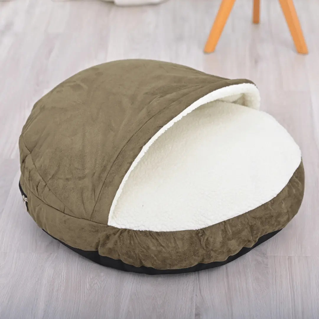 Calming Ultimate Anti-Anxiety Dog Bed – Cozy Hooded BedBrown pet bed with white interior on a light wooden floorJoypup