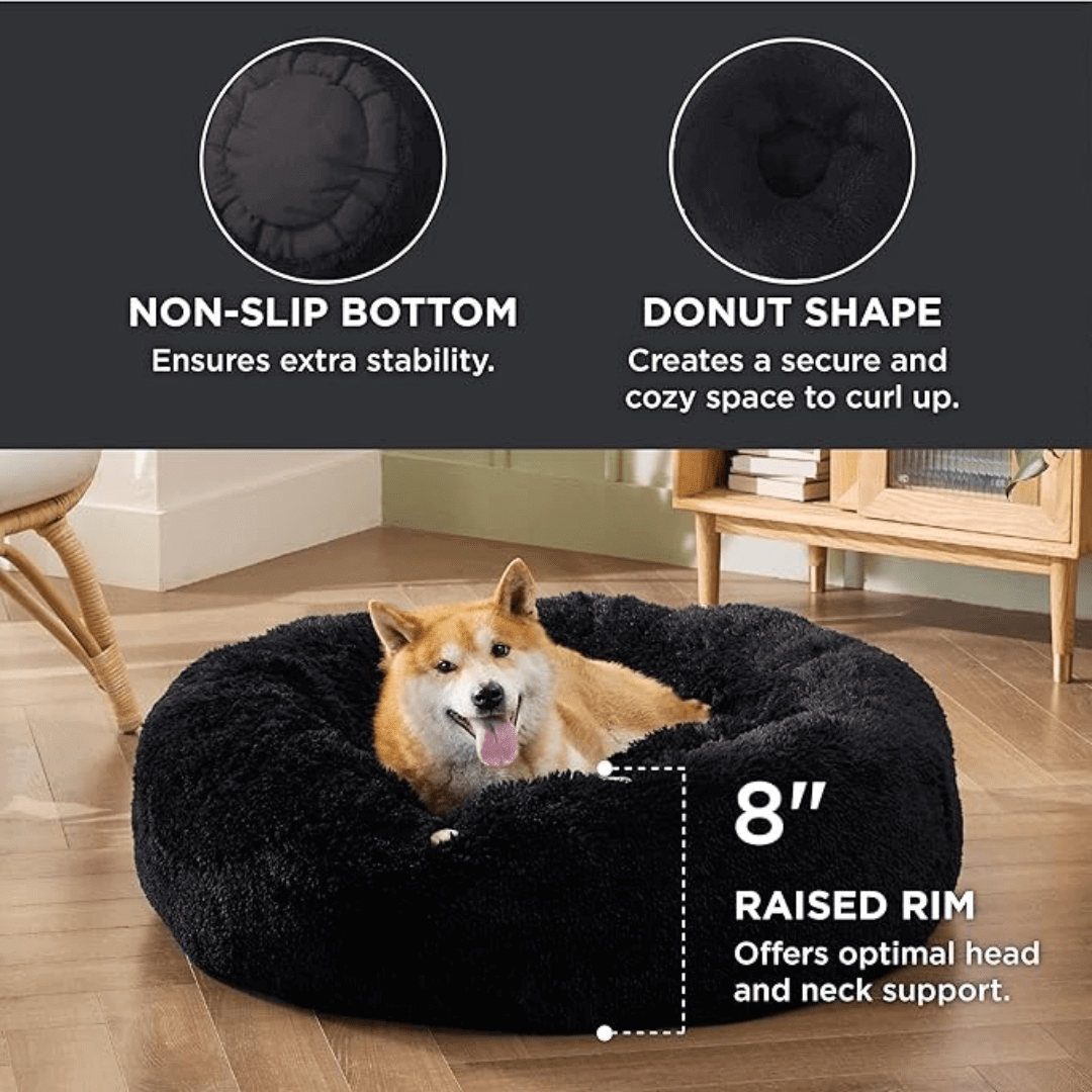 Soft Donut Cuddler Pet Bed - Ultimate Anti-AnxietyDog lying on a black donut-shaped pet bed with features highlighted.Joypup