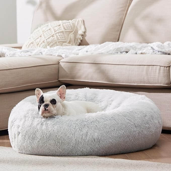 Soft Donut Cuddler Pet Bed with plush faux fur and round design for cozy anti-anxiety comfort and restful sleep for dogs and cats